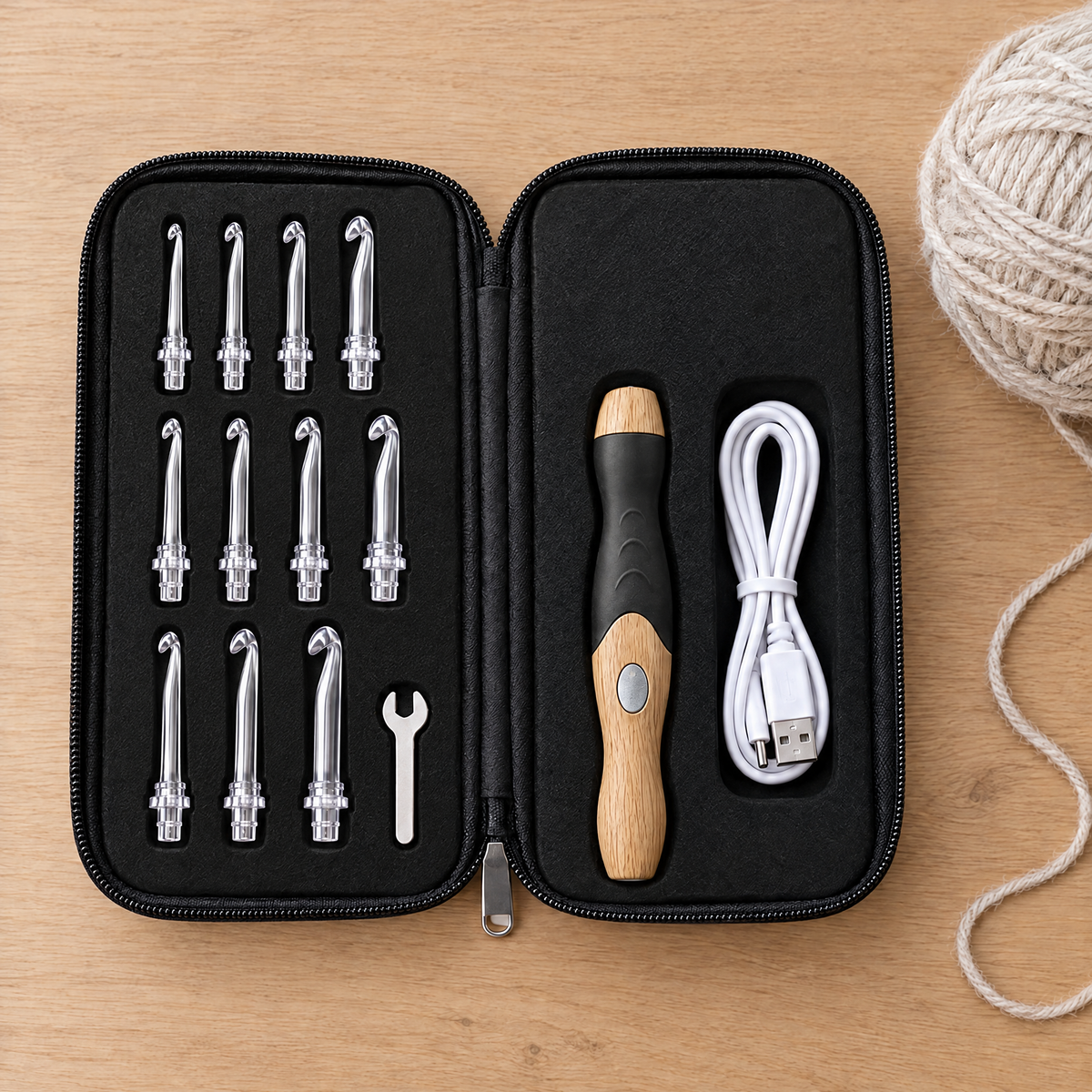 Öppet etui med handtag, spetsar, nyckel och kabel
